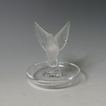 A Lalique glass Pintray, with central frosted glass mascot modelled as a Dove, with etched