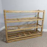 An early 20thC pine Bread Rack, top beam is split and will need refurbishing, W 140cm x H 105cm x