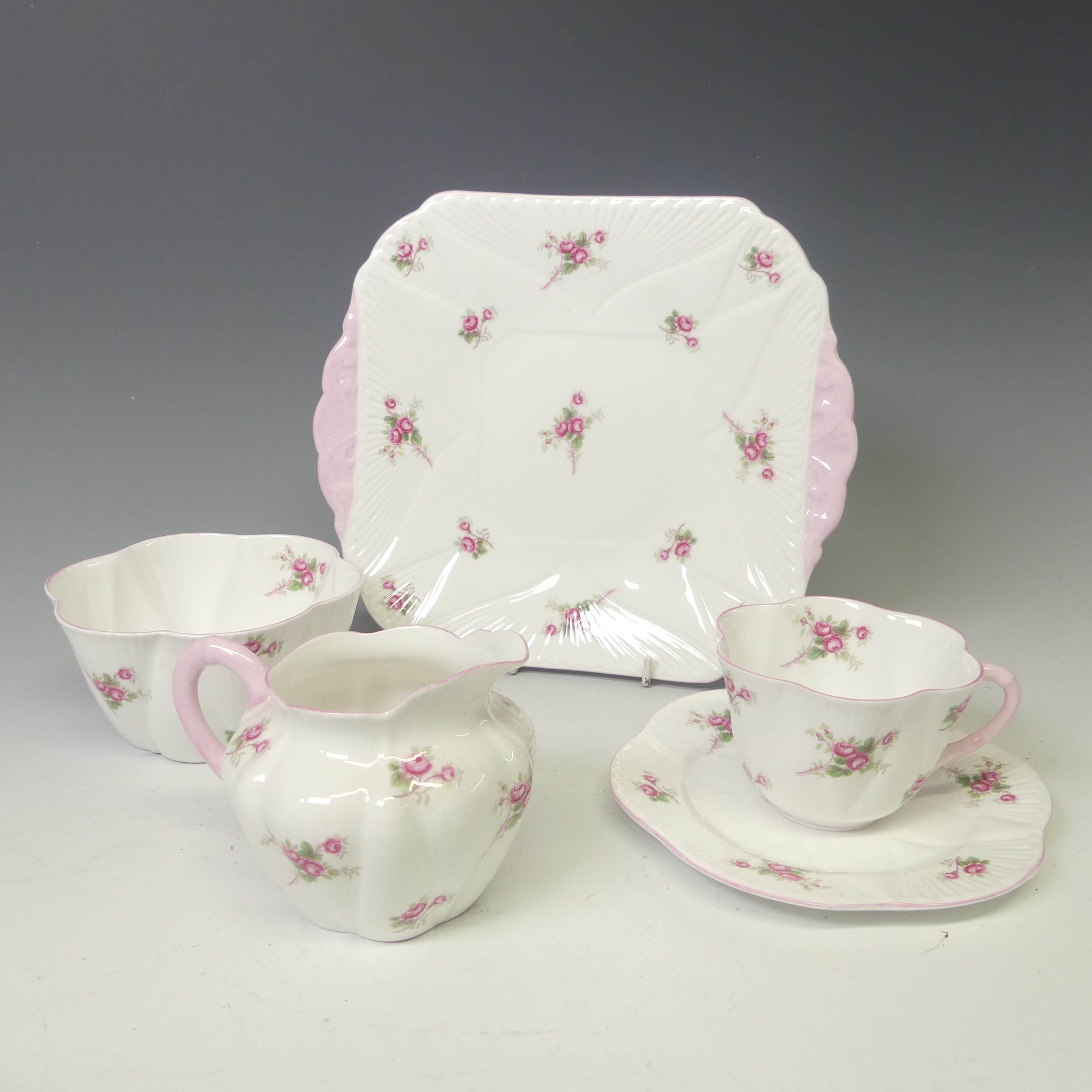 A Shelley 'Bridal Rose' pattern Tea Set, comprising six Cups and Saucers, Tea Plates, one broken,