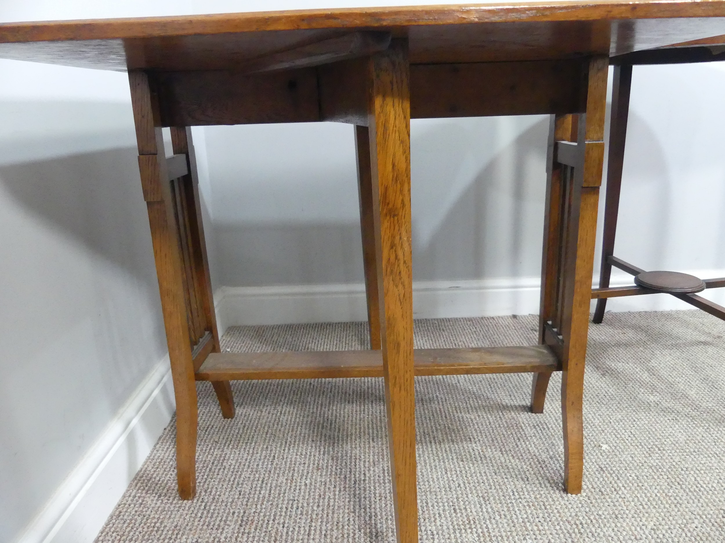 An Edwardian oak Sutherland table, with canted corners to the rectangular top mounted on square - Bild 8 aus 10