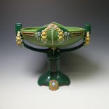 A 20thC Eichwald majolica Centrepiece, in the art nouveau style with moulded fruiting swags and