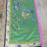 Two early 20thC Chinese Silk Hangings: a green silk panel embroidered with figures in garden