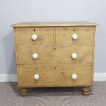 A pine Chest of Drawers, comprising two short over two long drawers, raised on turned feet, W 86cm x