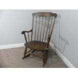 A vintage stick back rocking chair, W 63cm x H 102cm x D 74cm.