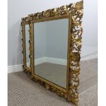 A pair of Georgian style reproduction gilt-wood framed mirrors, frame is W 65xm x L 80cm.