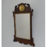 Georgian style walnut fretwork Wall Mirror. with gilt decoration, H:72cm x W:43cm.