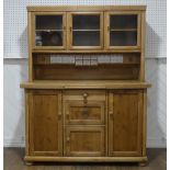 An Early 20thC glazed pine Dresser, with ceramic spice draws, W 137cm x H 173cm x D 55.5cm.