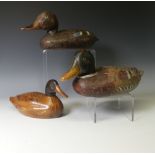 A vintage carved and painted wooden Decoy Duck, modelled as a mallard, L 37cm, together with two