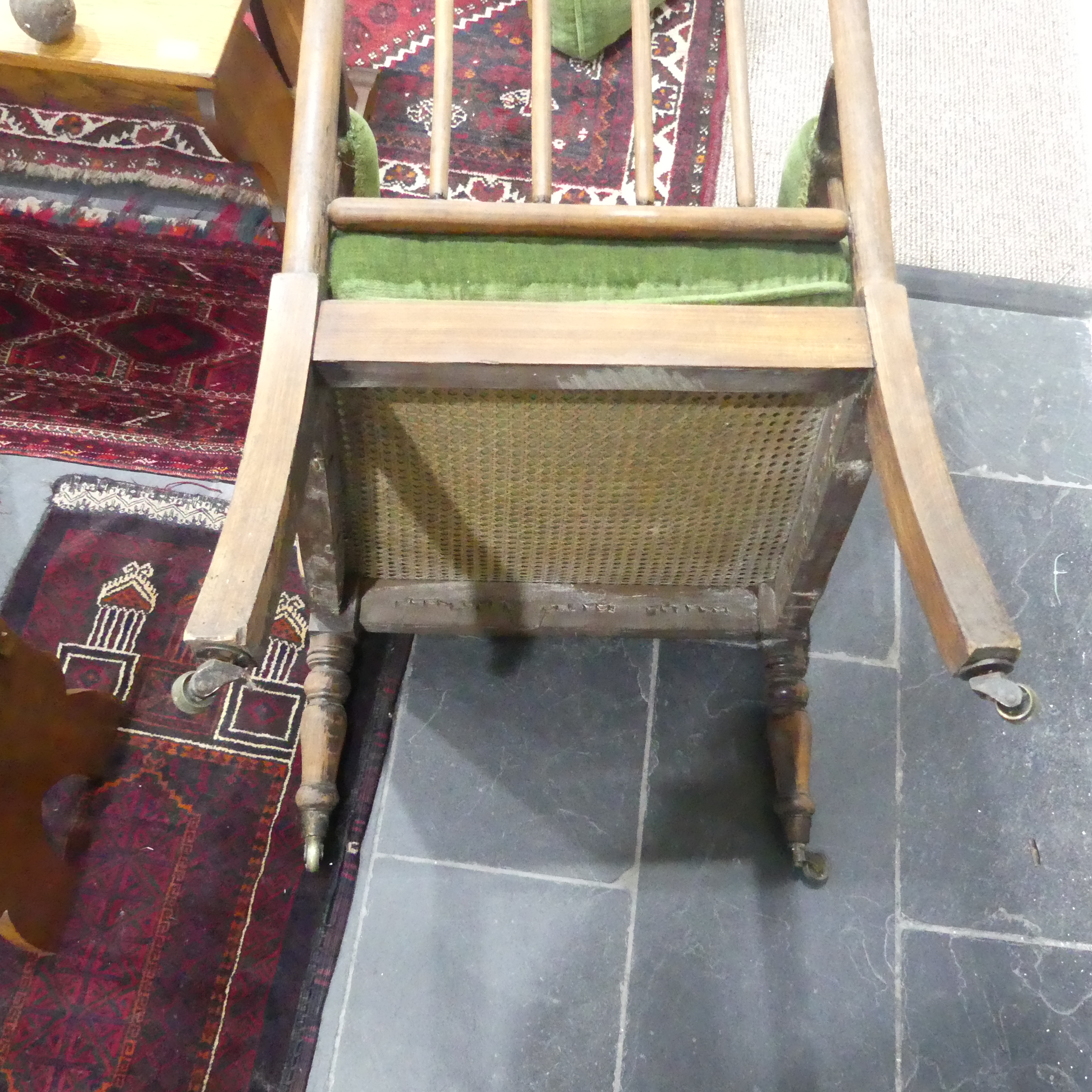 A Victorian pitch pine framed Armchair, with stick back and scroll arms, upholstered green armrests, - Bild 8 aus 15