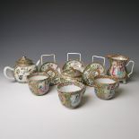 An antique Chinese porcelain matched famille rose Tea Set, comprising three near matched Tea Cups