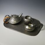 A Liberty & Co., 'Tudric' pewter three piece Tea Set, design no. 0231, together with a Tudric 043
