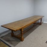 An Early 20thC oak refectory Dining Table, large rectangular four plank top with cleated ends,