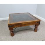 A 20th century rustic style oak and iron Coffee Table with glass top, W 80cm x D 80cm x H 40cm.