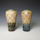 A pair of Royal Doulton stoneware Baluster Vases, decorated with painted flowers and moulded
