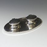 A George V silver double Inkwell, by A & J Zimmerman Ltd., hallmarked Birmingham 1916, of oval