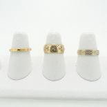 A 22ct yellow gold Band, of octagonal form with worn engraved decoration, Size L, 3.2g, together