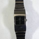 A Rado quartz Wristwatch, with black dial and quarter hour baton markers, case 20mm wide, on