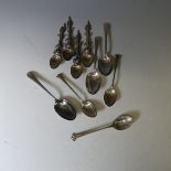 Four early 20thC Chinese export silver Spoons, makers mark Kwong Man Shing, with handles modelled as