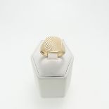 A 9ct yellow gold Signet Ring, the squared front with engraved sunburst decoration, Size R, 6.8g.