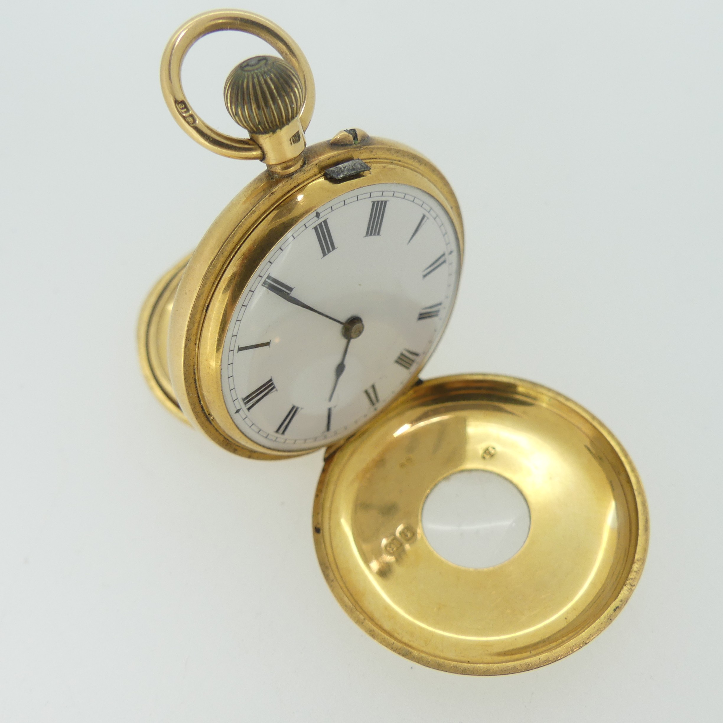 An early 20th century 18ct gold half hunter Pocket Watch, with 18ct gold cuvette cover, the enamel