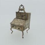 A 19thC Dutch silver miniature Bureau, import marks for David Bridge, London, 1894, with hinged