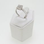 A 9ct white gold and diamond cluster Ring, the square front set with three rows of three small