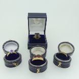 Four 9ct gold Rings; one set smokey quartz, Size N, one in an antique style set three red pastes,