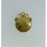 A Victorian gold Sovereign, dated 1887, with soldered pendant mount.