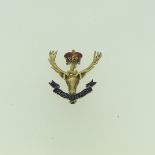 A 9ct gold and enamel Regimental Crest Brooch, for the Seaforth Highlanders (Canada), 3.2cm long,