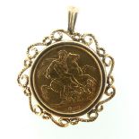 A Victorian gold Sovereign, dated 1890, in a 9ct gold open scrolling pendant mount, total weight