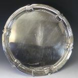 A George VI silver Salver, by Mappin & Webb Ltd., hallmarked Sheffield, 1949, of shaped circular