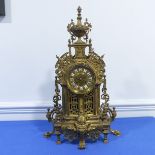 A French gilt brass Gothic revival style Mantel Clock, late 19th century, the pierced