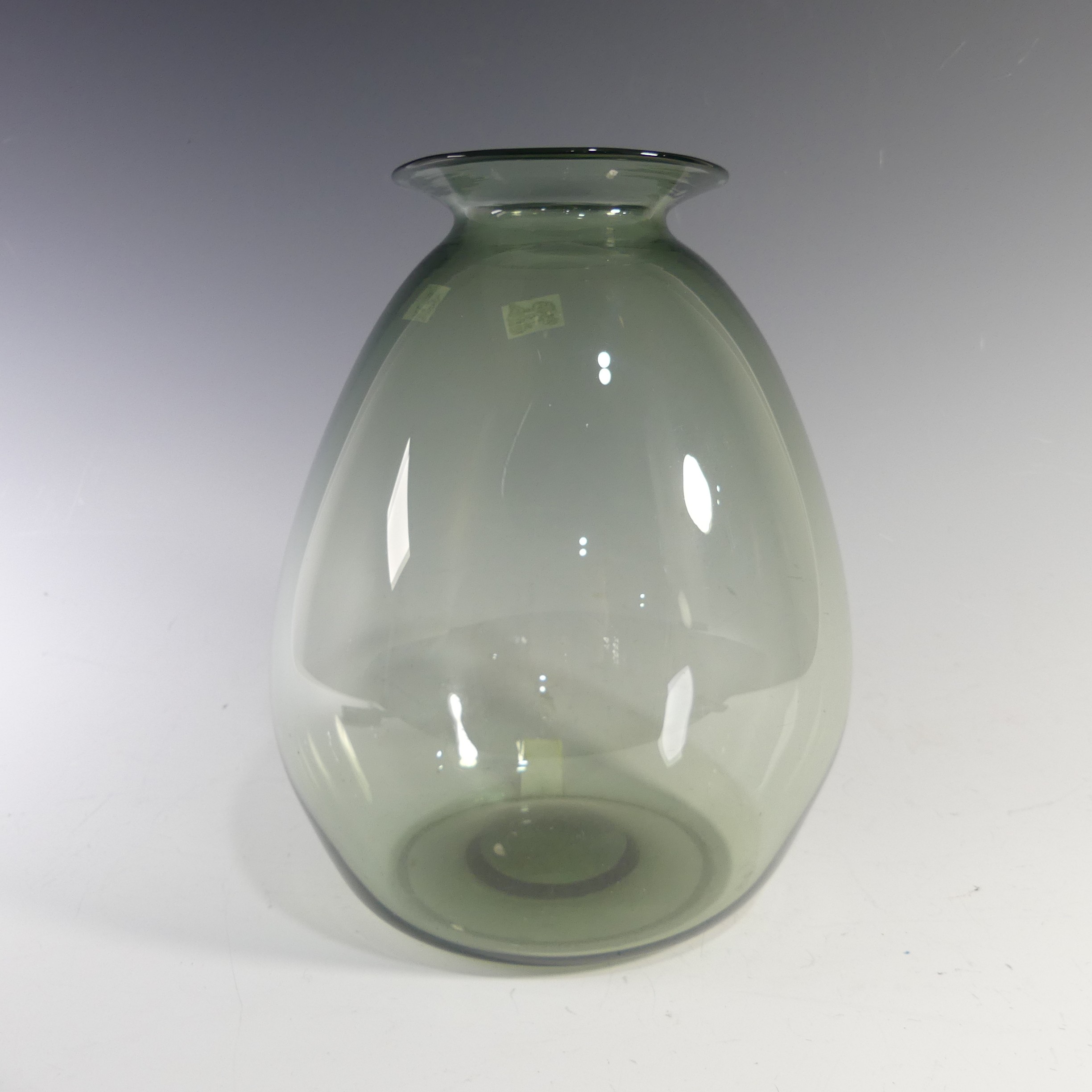 A Keith Murray for Brierley glass Vase, with flared rim and bulbous body, dark green shade, etched