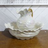A large cream lustreware Jug and Basin, with a pearlescent effect, note minimal damage to both jug