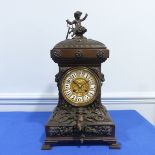 A French bronzed-metal Mantel Clock, late 19th century, the architectural case surmounted with an