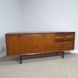 A teak Scandart Sideboard from the 1960s, a Danish design with two opening doors which reveal a