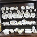 A Royal Worcester 'Evesham' pattern Dinner Service, four Dinner Plates, Sides Plates, Tea Cups and