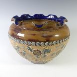 A Doulton Lambeth stoneware Jardiniere, with brown and cream ground and tubelined floral decoration,