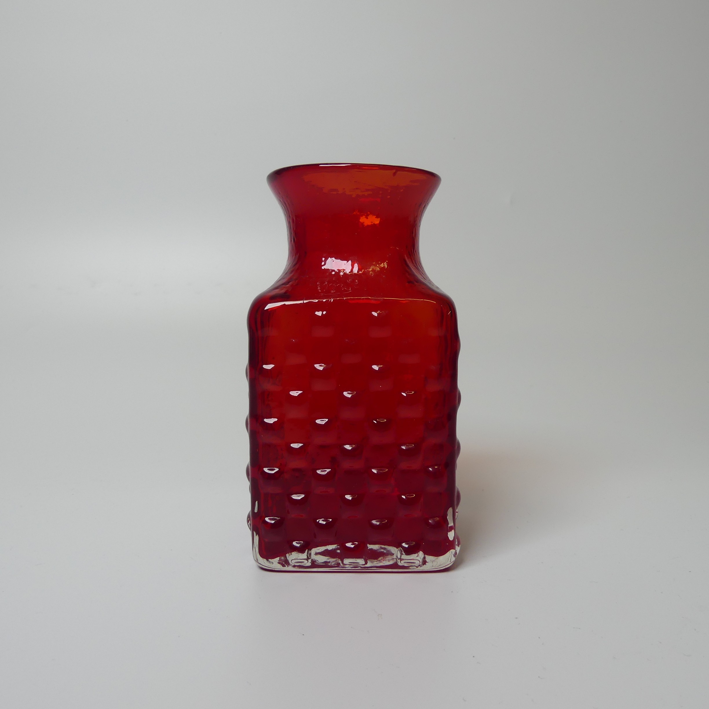 A Geoffrey Baxter for Whitefriars 'Chess' Vase, in ruby red, H15cm.