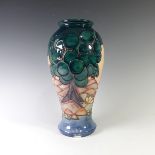 A Moorcroft 'Mamoura' pattern baluster Vase, designed by Sally Tuffin, with tubelined decoration