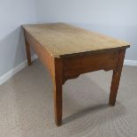 An Edwardian six seater pine Kitchen Table, with a pair of frieze draws and angled table top