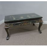 A 20thC Chinese inspired lacquer Coffee Table, rectangular top applied with figures in traditional