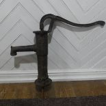 An Antique hand operated cast iron water pump, W 36 cm x H 67 cm x D 16 cm.