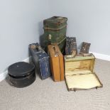 A lot of five various vintage suitcases together with a steamer trunk and a hatbox containing