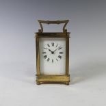 A 20th century French gilt brass Carriage Clock, note rear door is stiff and prone to getting stuck,
