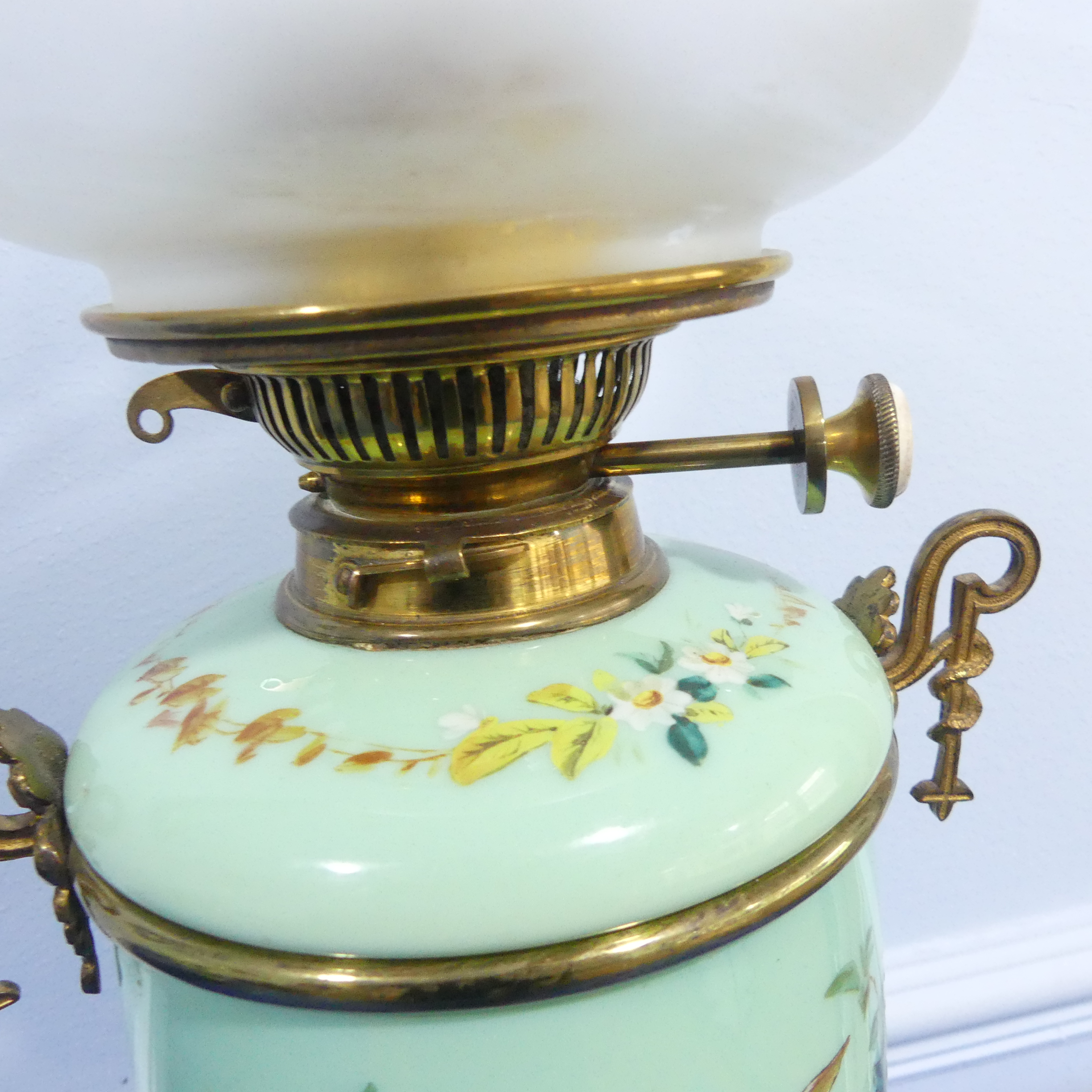 An Edwardian glass and gilt-metal oil lamp, with  moulded shade above a green opaque oviform lamp - Image 8 of 9