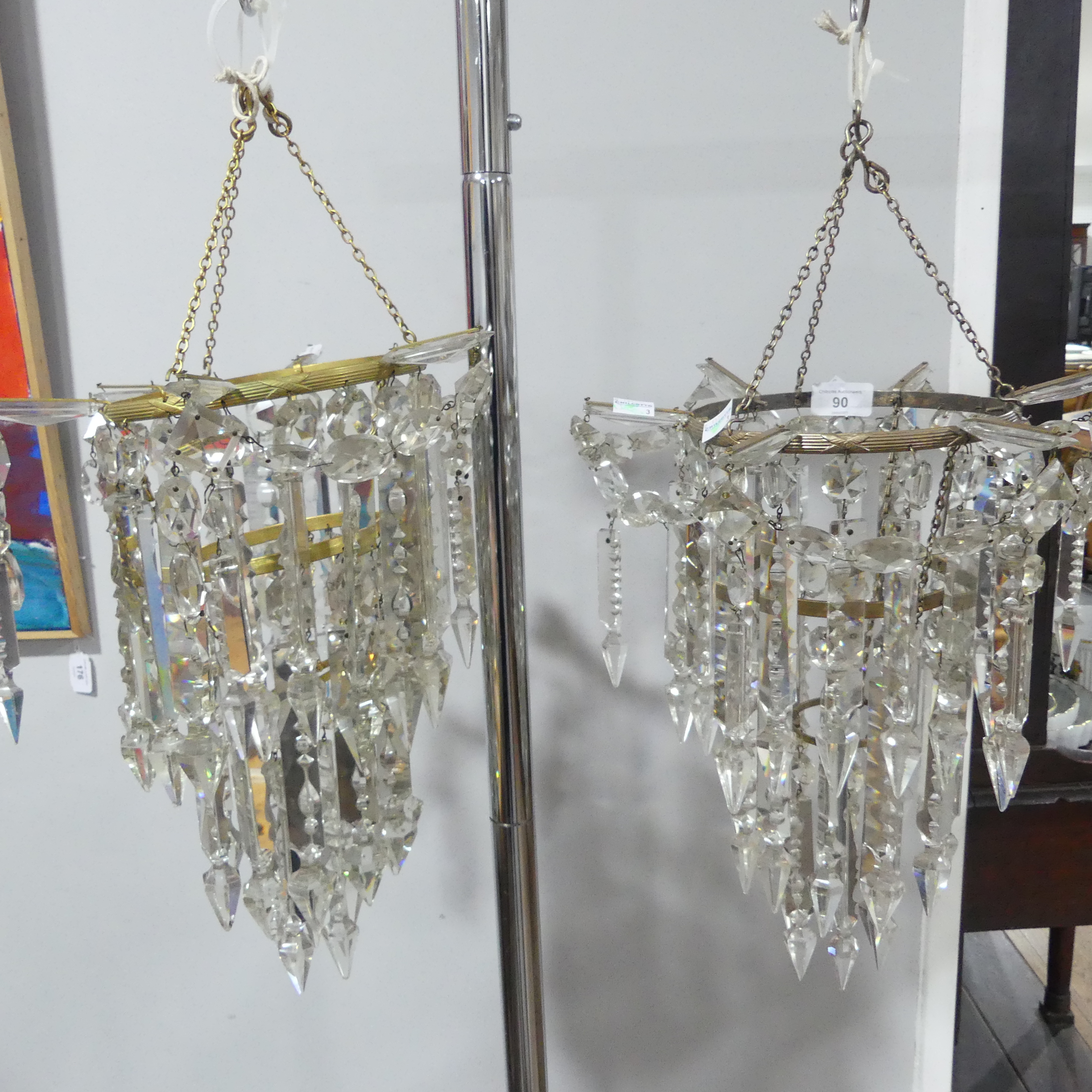 A pair of 19th century 2-tier hanging Lustres, with clear glass crystal droplets and metal ceiling