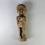 An Inuit Carved Bone Sculpture of standing figure, signed Karoo Ashevak (1940 – October 19, 1974),