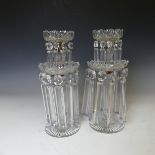 A pair of early 19thC hand cut clear crystal glass Lustres, each with ten faceted droppers, raised