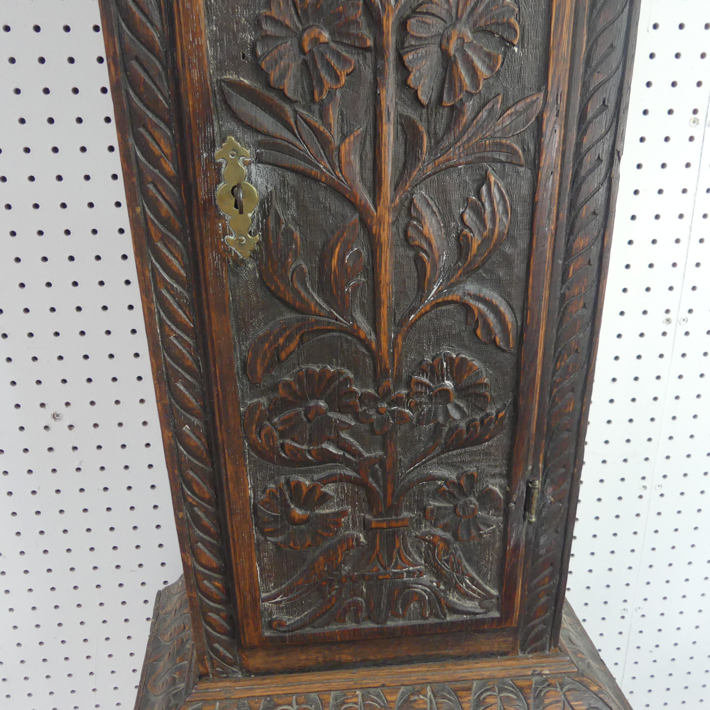 W. Fletcher, Leeds, a carved oak 8-day longcase clock with two-weight movement striking on a bell, - Image 17 of 29